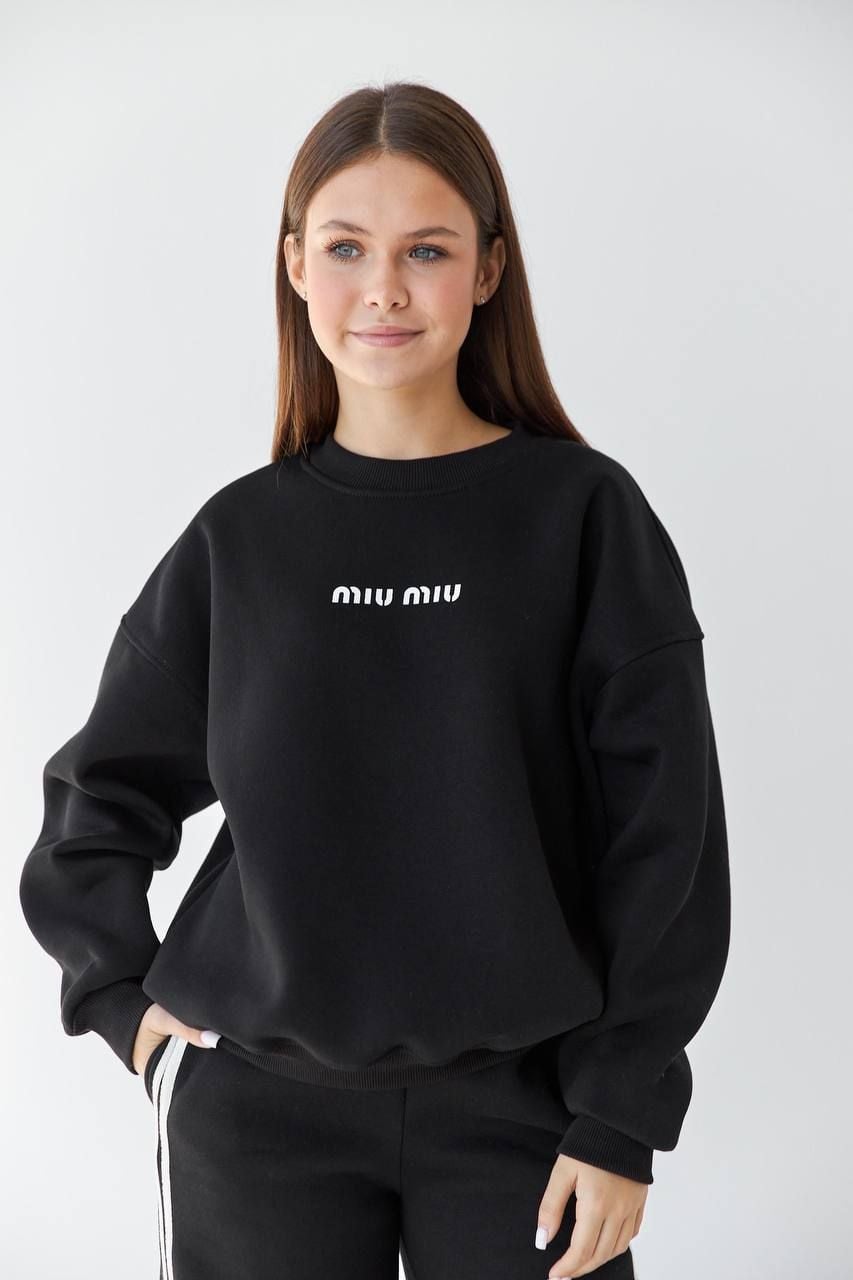 Светрик 24-MIO чоорний 122(р)