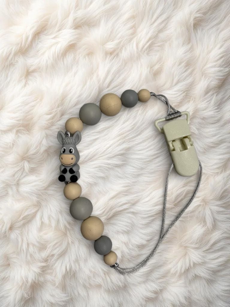 Пустушка та аксесуари тримач(хлопчик) міх 1(р)