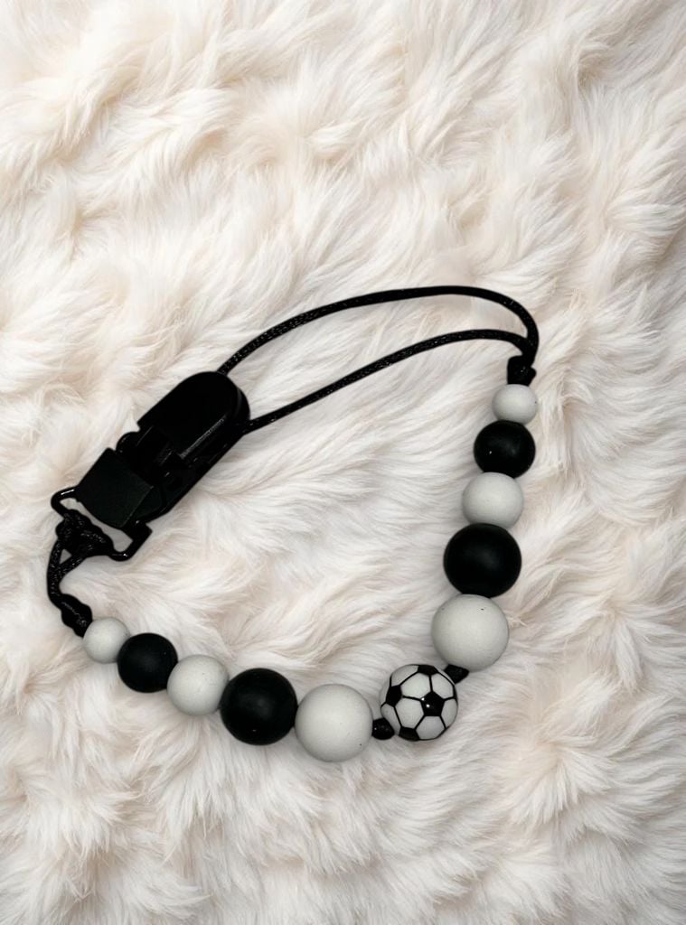 Пустушка та аксесуари тримач(хлопчик) міх 9(р)