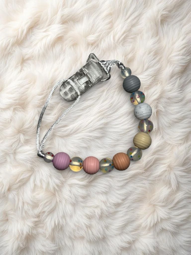 Пустушка та аксесуари тримач(дівч) міх 7(р)