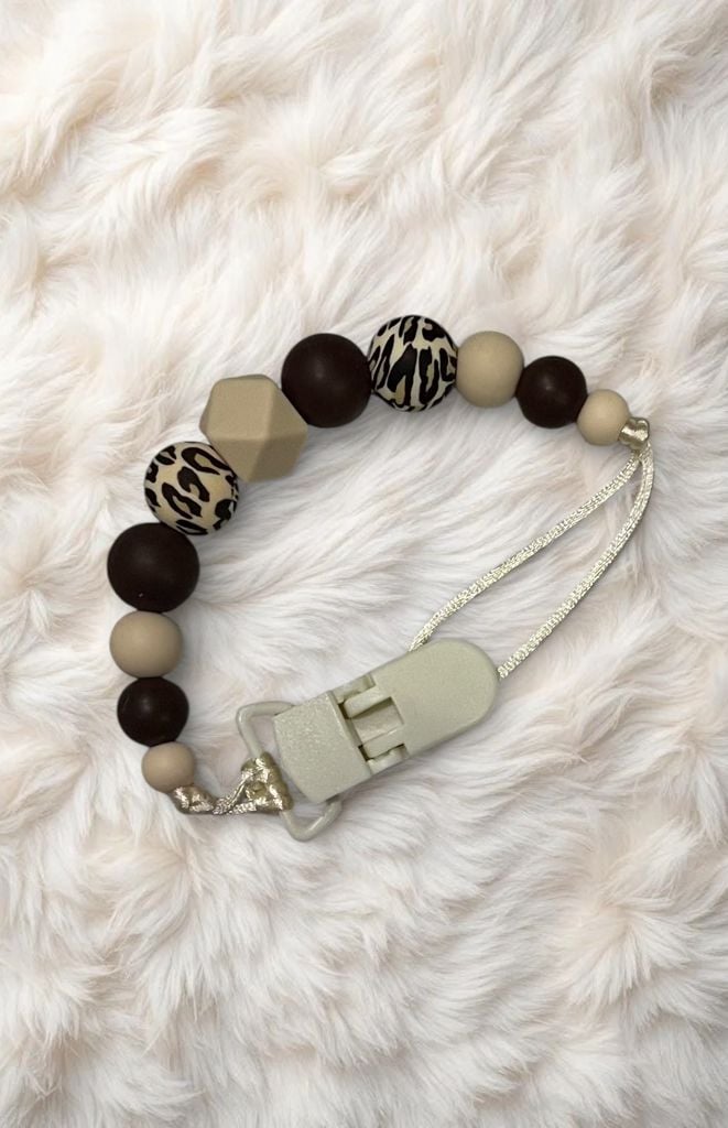 Пустушка та аксесуари тримач(дівч) міх 8(р)