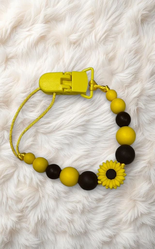 Пустушка та аксесуари тримач(дівч) міх 9(р)