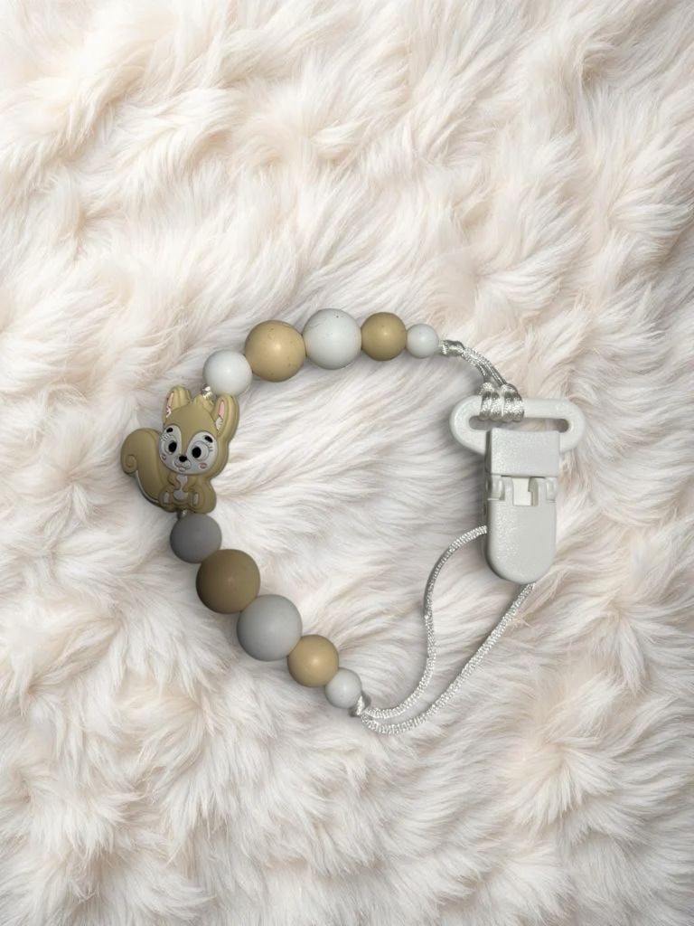 Пустушка та аксесуари тримач(уні) міх 1(р)